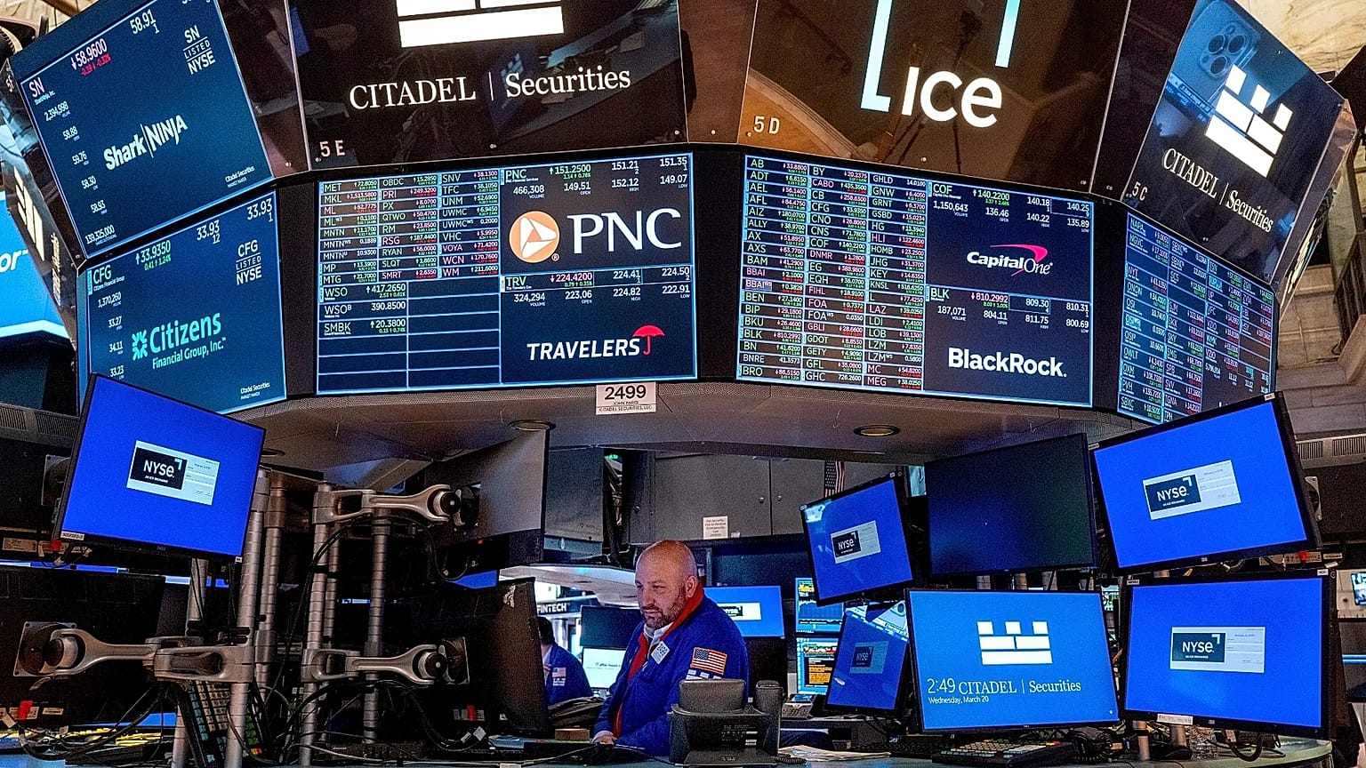 A trader works on the floor of the New York Stock Exchange, 20 March, 2024