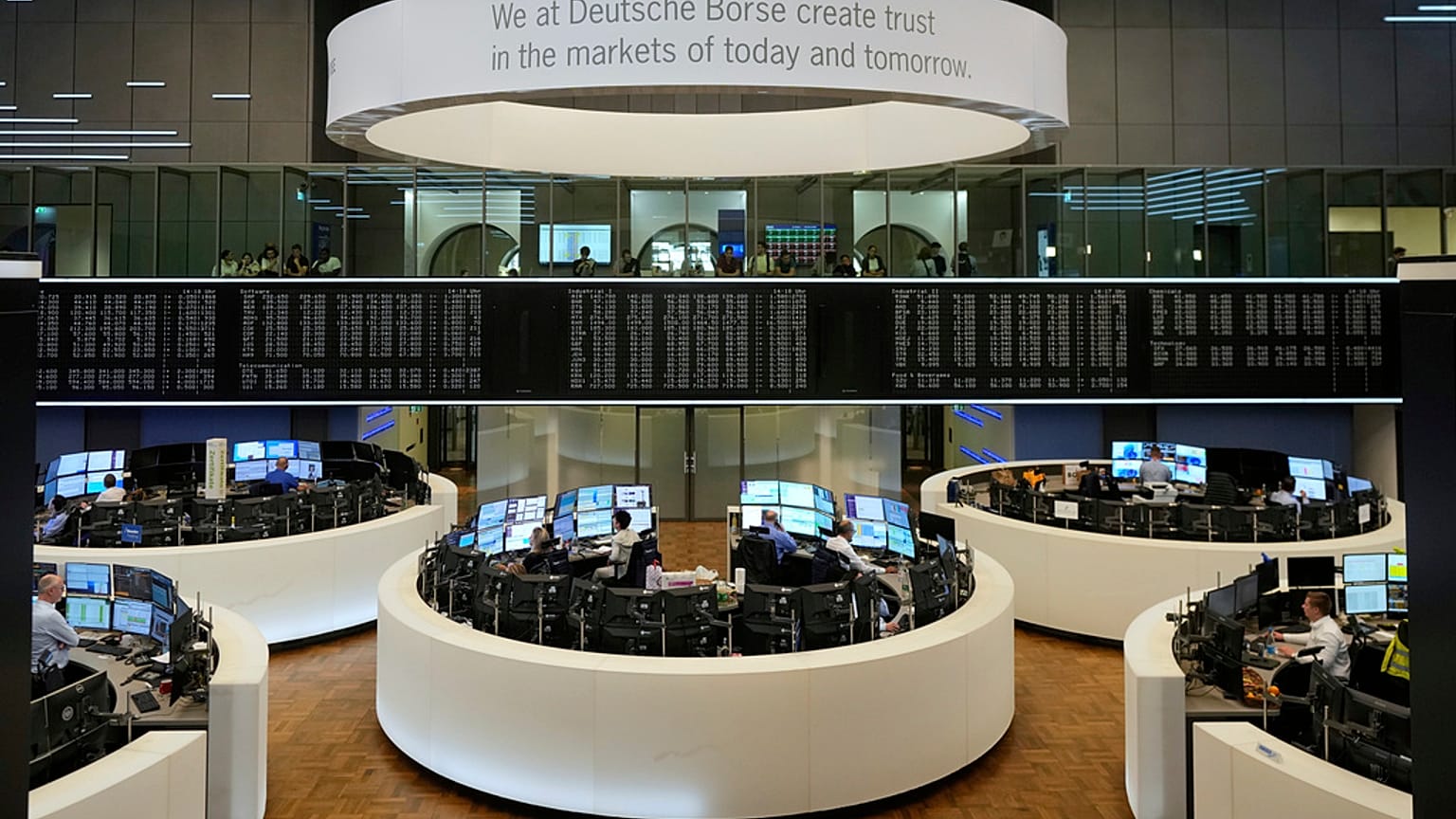 File - roker look at video screens at the stock market in Frankfurt, Germany. 16 April 2025