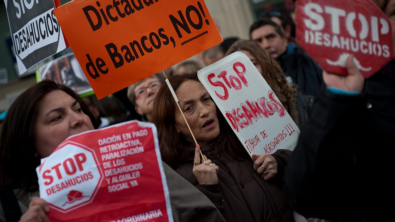 Mortgage owners in Spain protest banks.