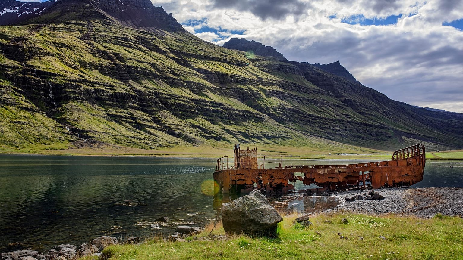 An old rusty wreck in the Mjoifjordur region of Eastfjords in Iceland