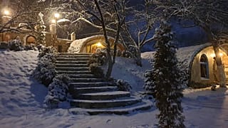 In the deep of winter, the fantastical hamlet has become a snowy wonderland, much to the pleasure of the guests.