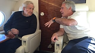 FILE: This undated photo released by Democrats on the House Oversight Committee on 18 December 2025 shows Jeffrey Epstein talking with Noam Chomsky. 