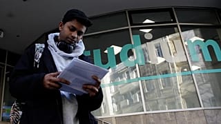 Deep Shambarkar holds his request to leave the country in his hand, Berlin on 17 December 2025