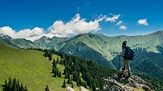 A man hiking a mountain