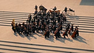 A scene from Nabd Qatar featuring the Qatar Philharmonic Orchestra 