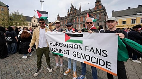 Protesters hold a banner during a Pro-Palestinian demonstration for excluding Israel from Eurovision - 2024